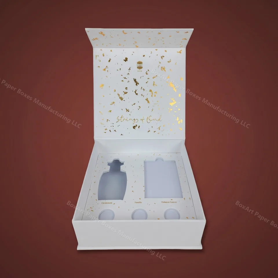 Ajmal Strings of Oud — Magnetic Set Box — luxury magnetic boxes manufactured in Dubai by BOXART — Magnetic-closure rigid gift box with die-cut foam insert for bottle, box and three note vials — cardamom, vanilla, tobac