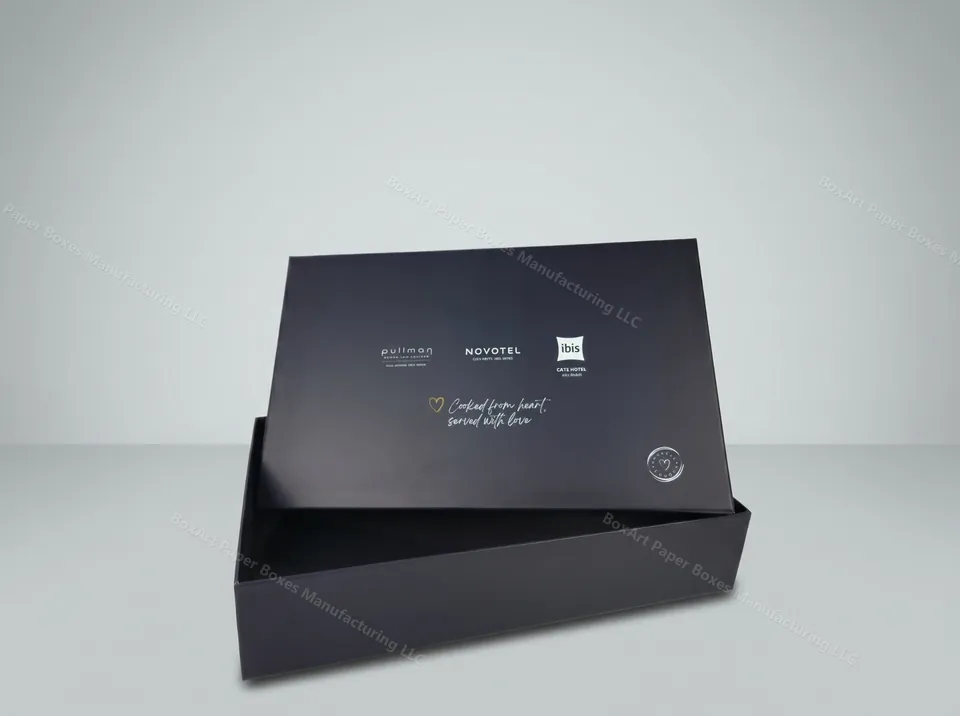 Accor Hotels — luxury rigid boxes manufactured in Dubai by BOXART — Rigid lift-off gift box, navy & white