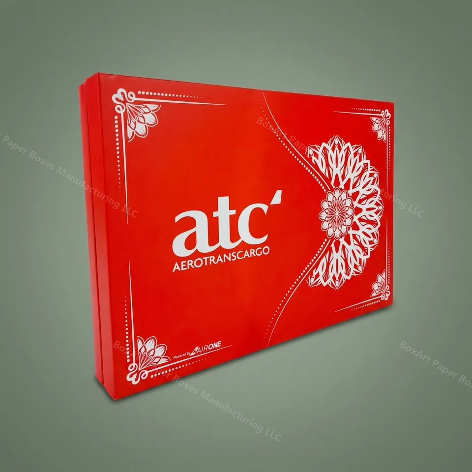 ATC Magnetic Closure Gift Box — luxury magnetic boxes manufactured in Dubai by BOXART — Rigid gift box with magnetic closure, red matt lamination and white mandala foil print for AeroTransCargo.